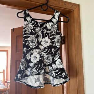 Black and white peplum tank never been worn!